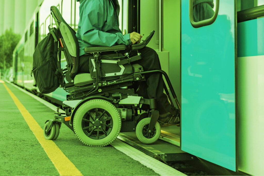 wheelchair-user-entering-train Wheelchair user getting on a train