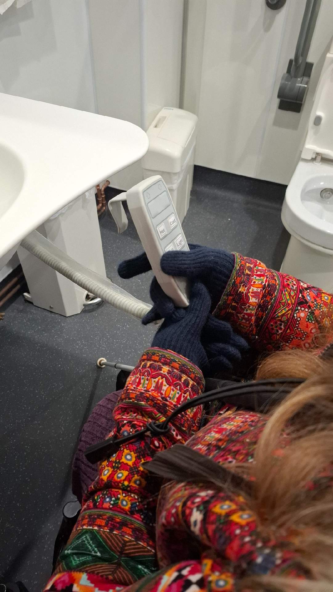 Remote control for taps and light - was hard to reach